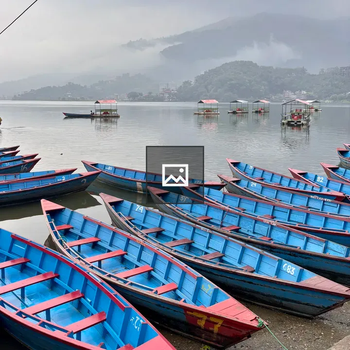 Fewa Lake Boats at Shore