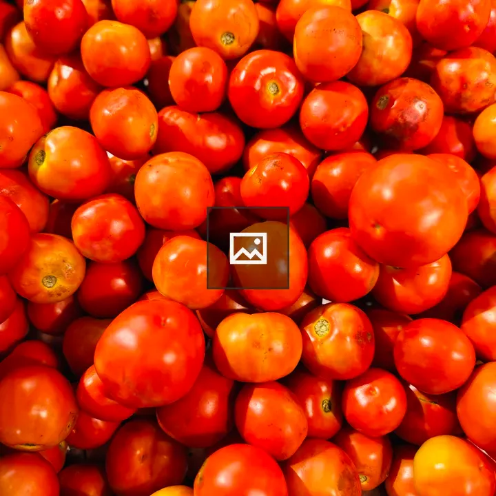 Tomatoes in a vibrant pile