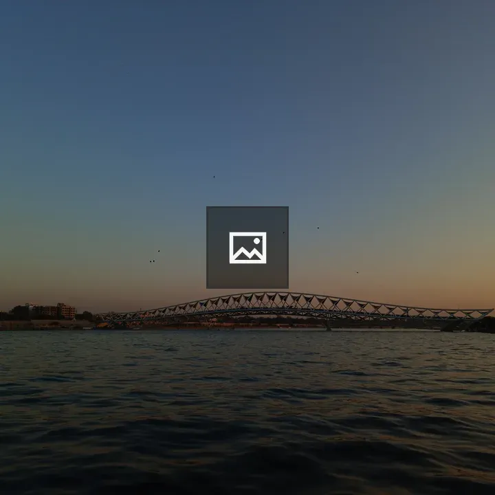 Bridge meets river at dusk