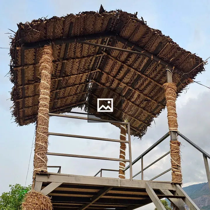 Raised viewing platform with palm roof