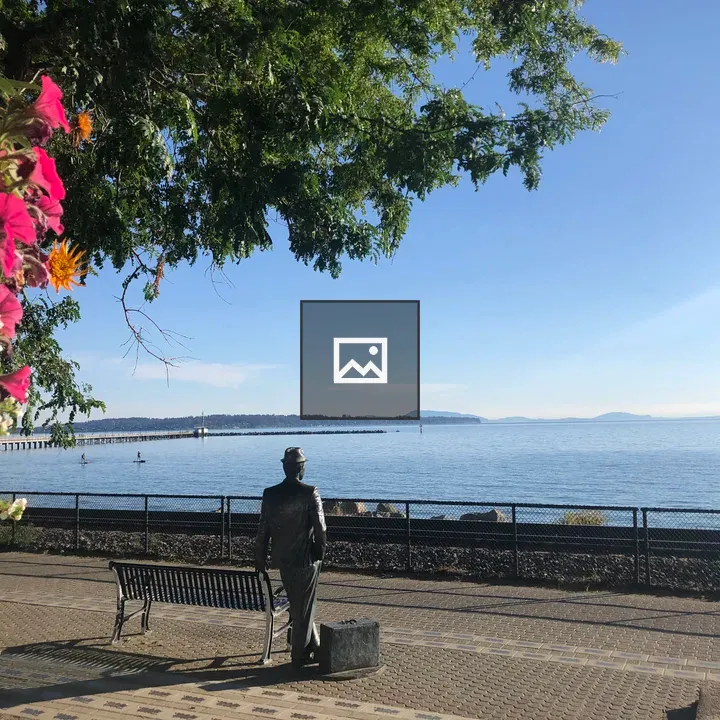 Promenade at West Beach bench and statue