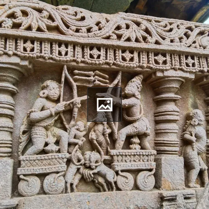 Ancient stone carving of warriors