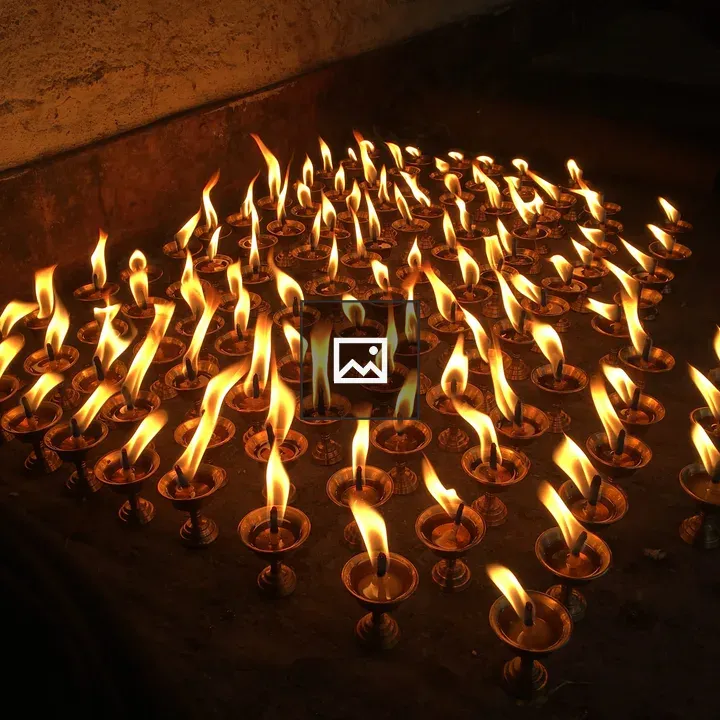Oil lamps on dark surface