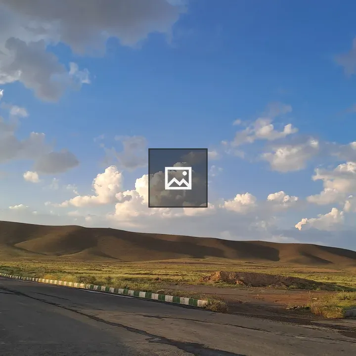 Scenic landscape with hills and road