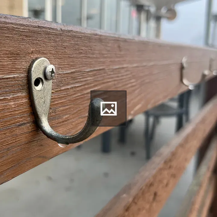 Coat hooks on a foggy morning