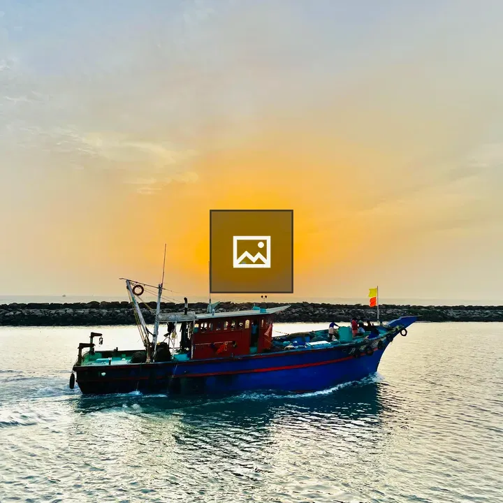 Fishing boat and fishermen near shore