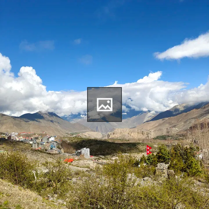 Mountainous landscape town under blue sky