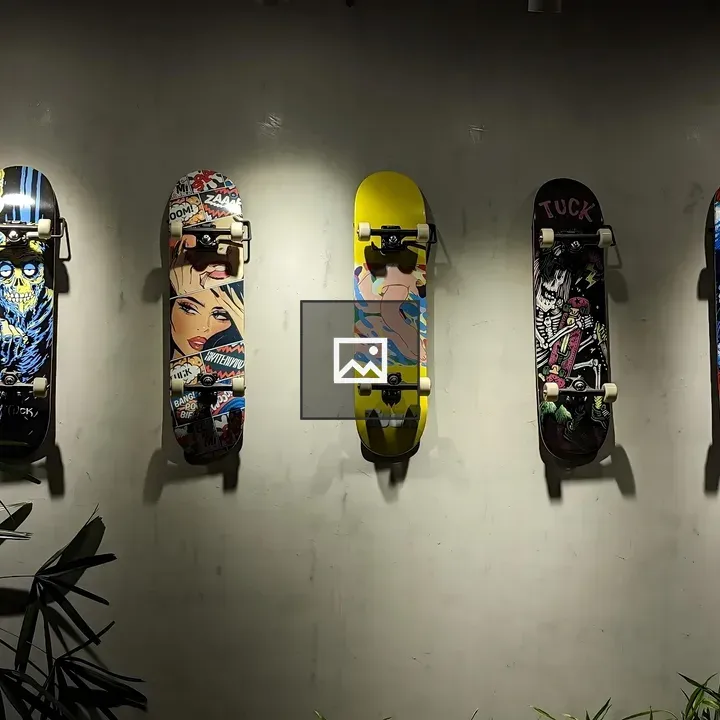 Five skateboards on wall