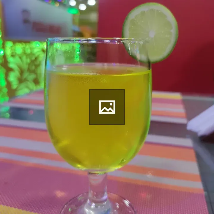 Glass of soft drink with lemon