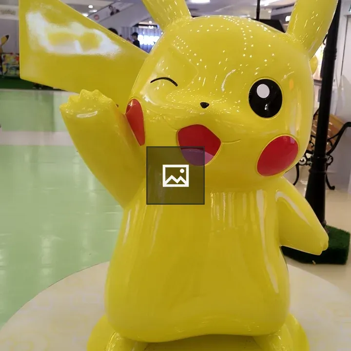 Pokélike yellow character figure