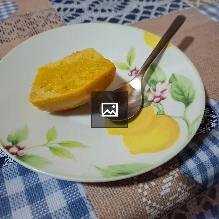 Orange cupcake on a plate
