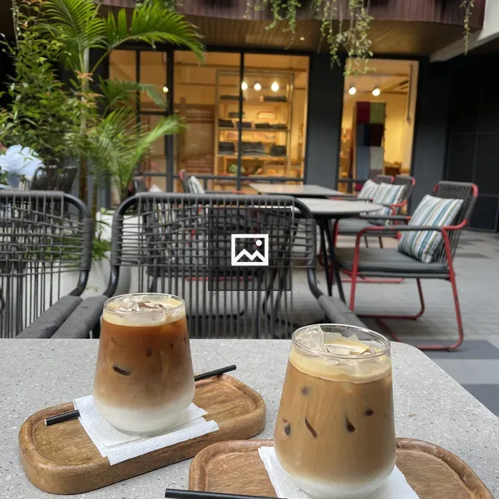 Two iced coffees on trays