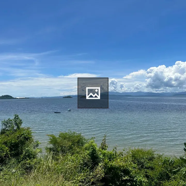 Calm Sea with Islands on Horizon
