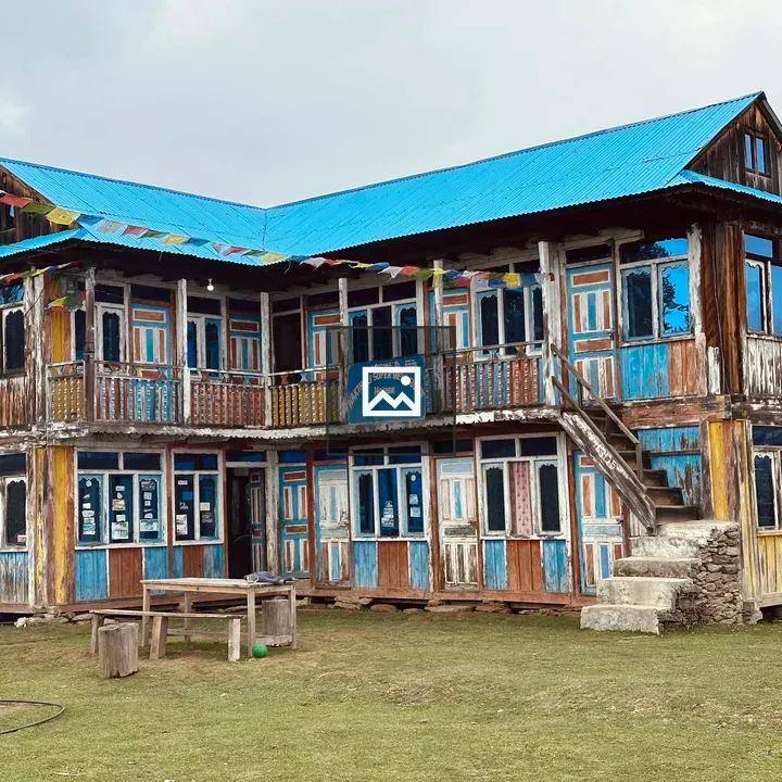 Rustic building with blue roof