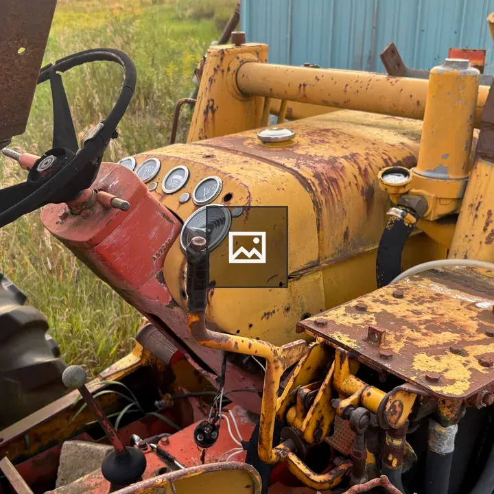 Controls of a rusted bulldozer