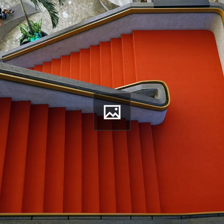 Aerial View of Red-Carpeted Staircase