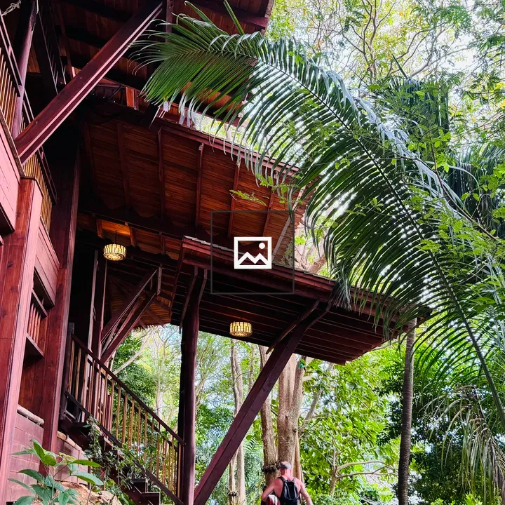 Tall wooden building with balconies