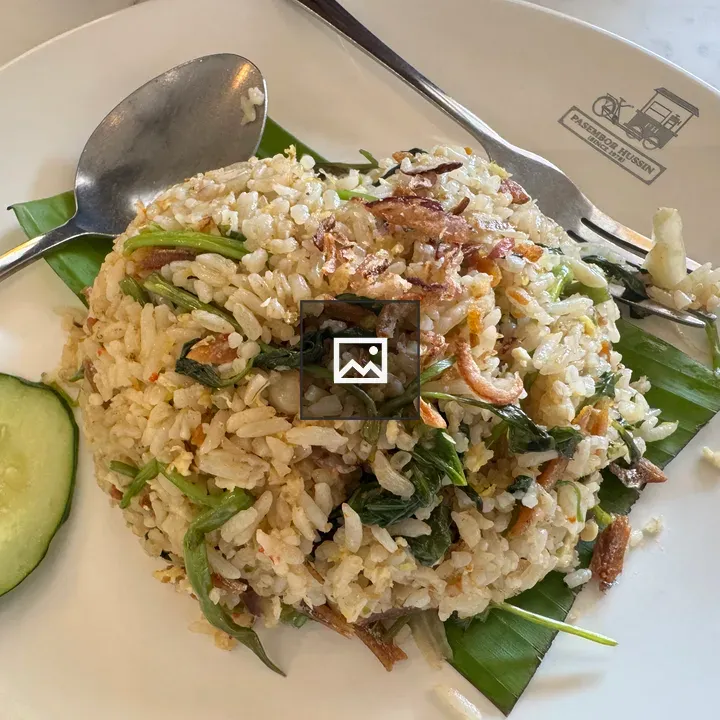 Plate of fried rice with vegetables
