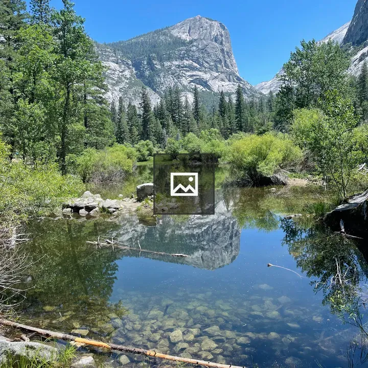 Serene mountain landscape with pond