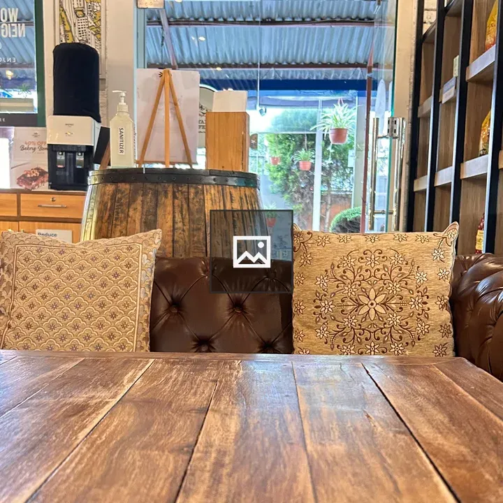 Wooden Table and Cozy Seating