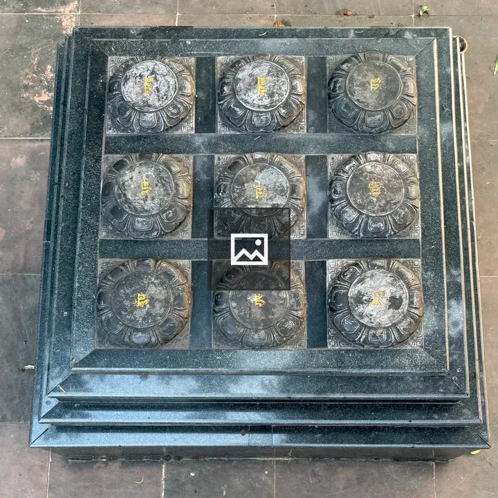 Symbolic sculpture on stone platform
