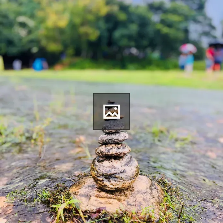 Pile of rocks in shallow water