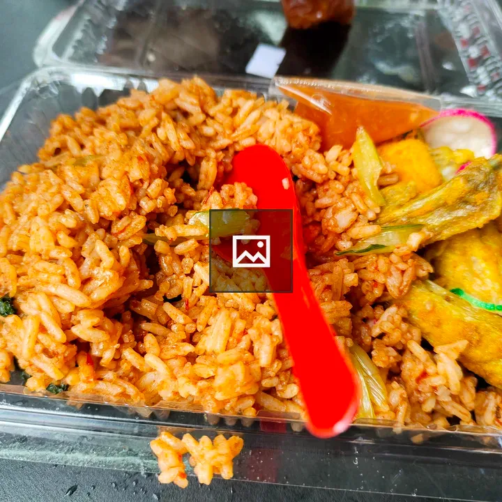 Rice and Vegetable Mix in Plastic Container