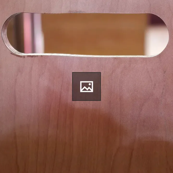 Wooden surface with cutout handle
