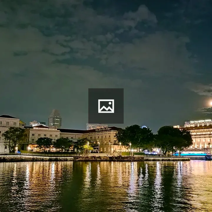 Night waterfront in Singapore with AC Museum and Fullerton Hotel
