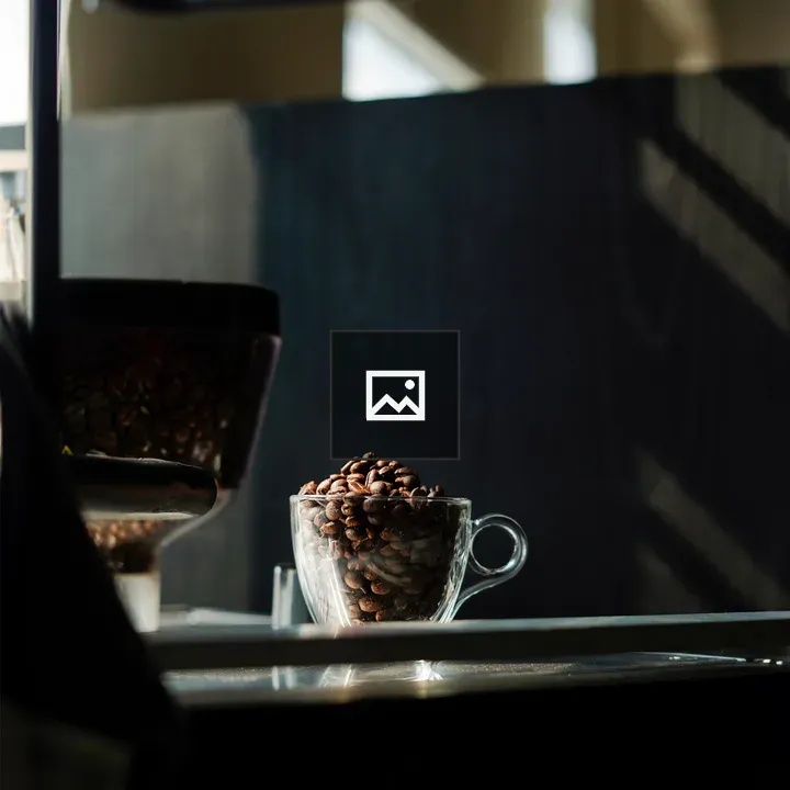 Glass cup with coffee beans