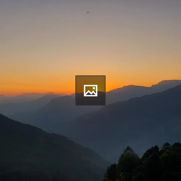Sunset Over Mountain Ridges
