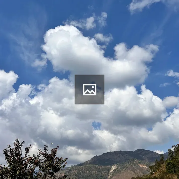 Cloudy Sky and Hills View