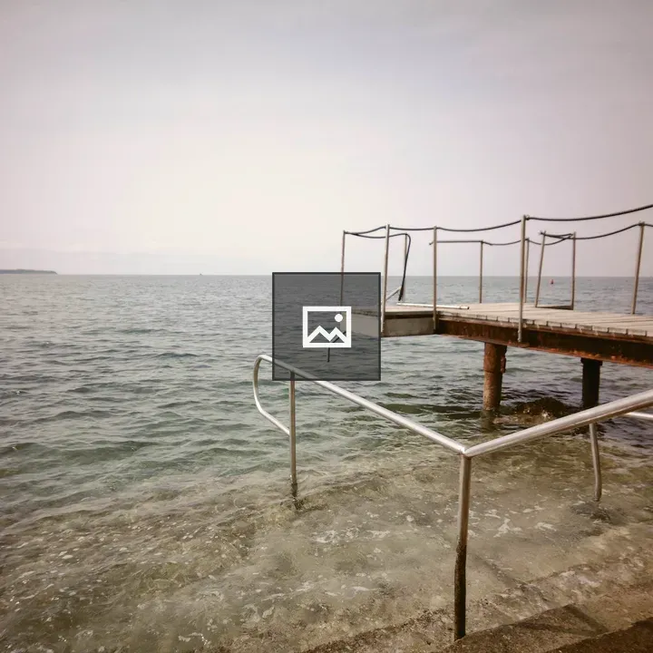 Pier over water at center