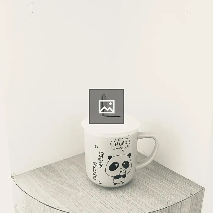 Decorative mug with lid and spoon