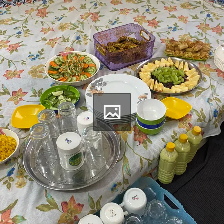 Colorful food spread on tablecloth