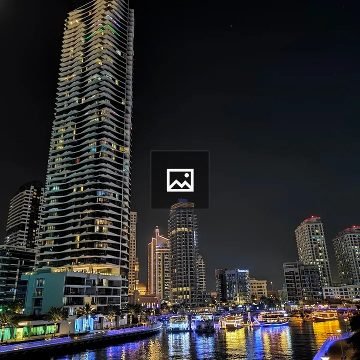 Brightly lit river scene in Dubai