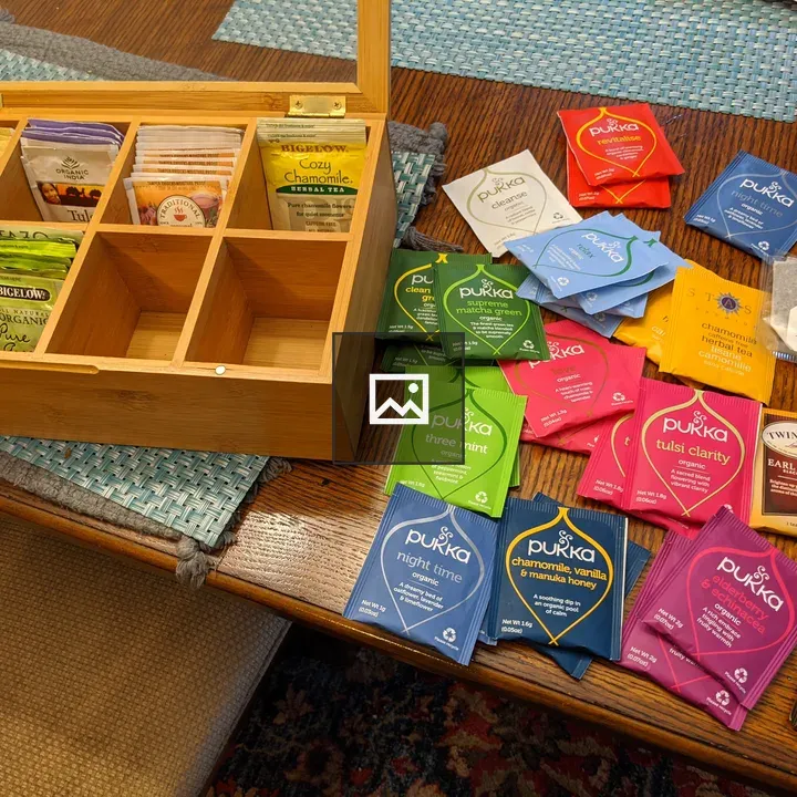 Tea bags and box on table