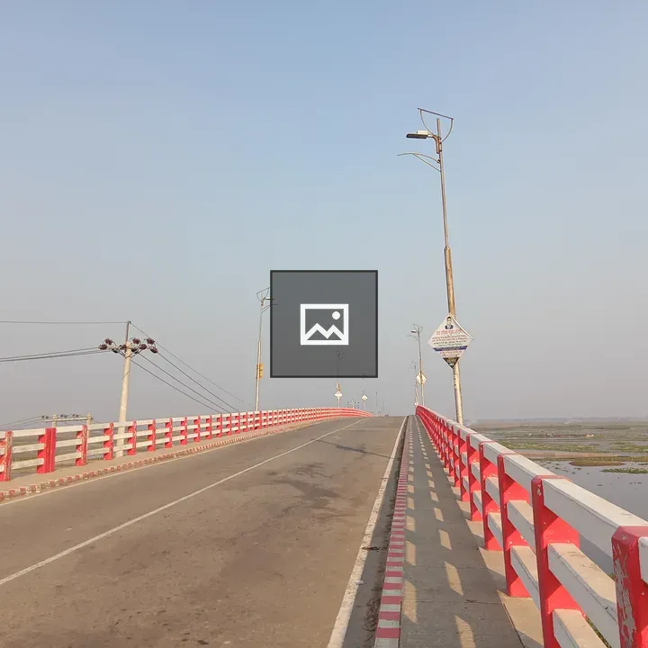 Bridge with red and white barriers