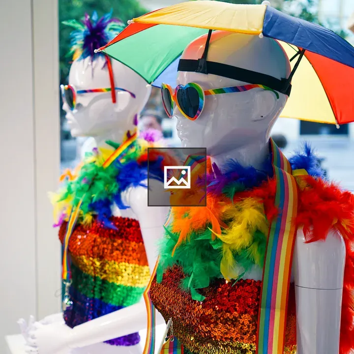 Mannequins in Colorful Shop Window