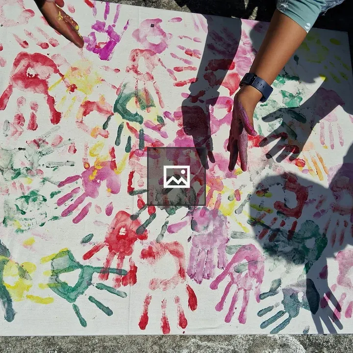 Colorful handprint collage
