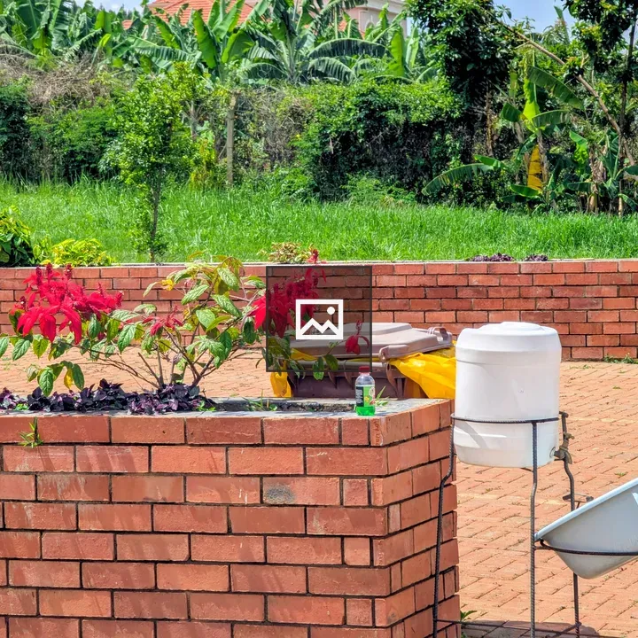 Red Brick Planter with Flowers