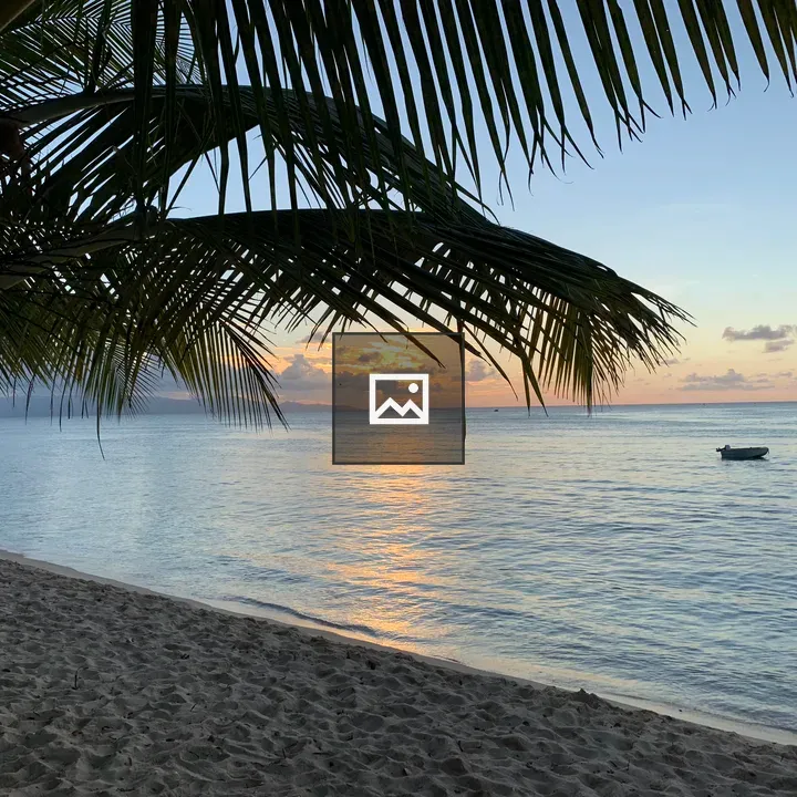 Sunset on Guadeloupe Beach with Boat