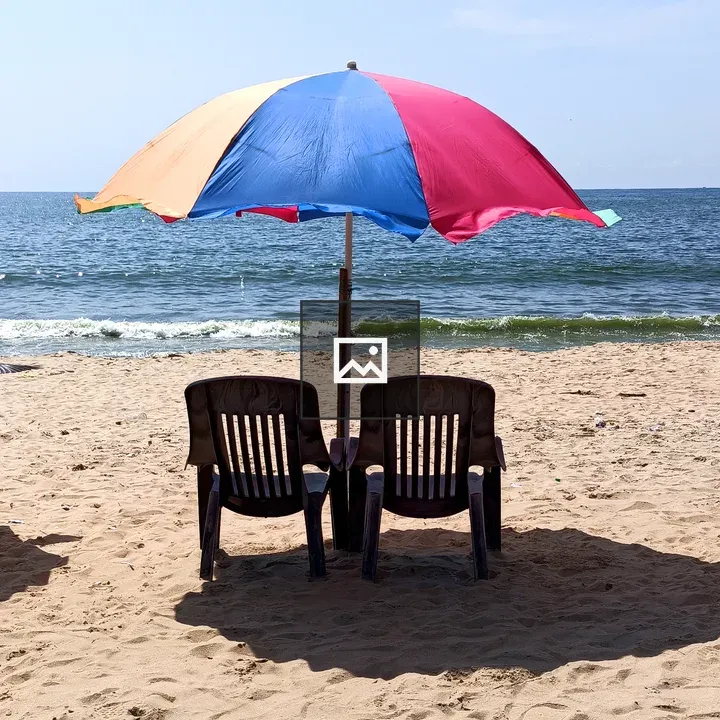 Chairs and Umbrella on Beach