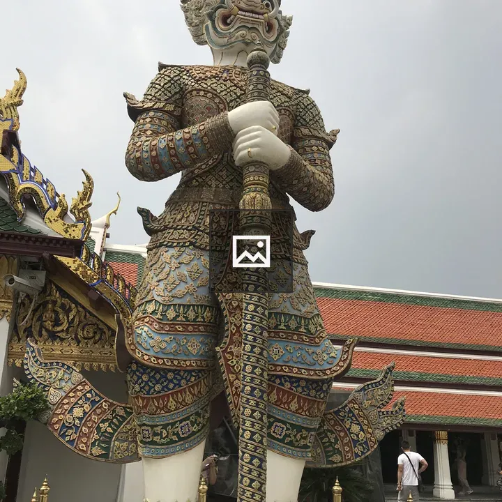 Yaksha statue with ornate costume