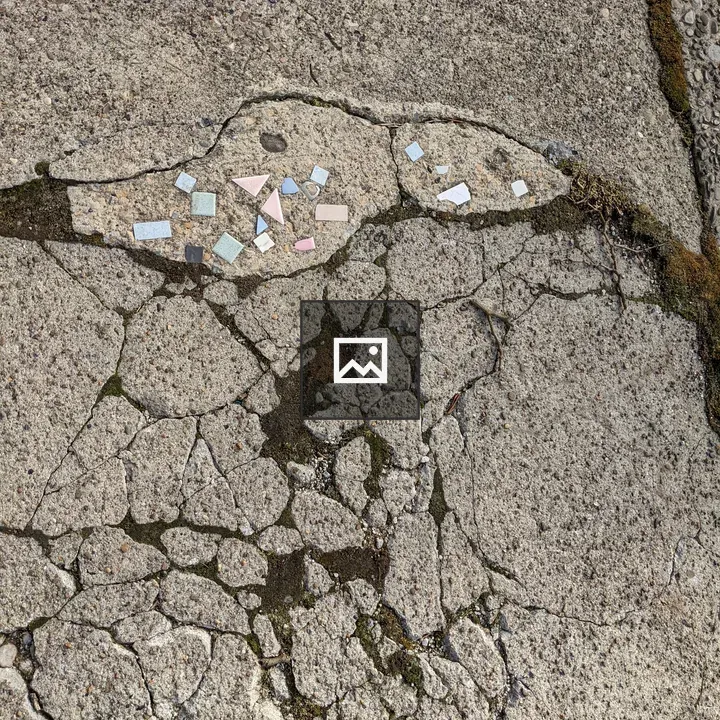 Broken sidewalk with tiles