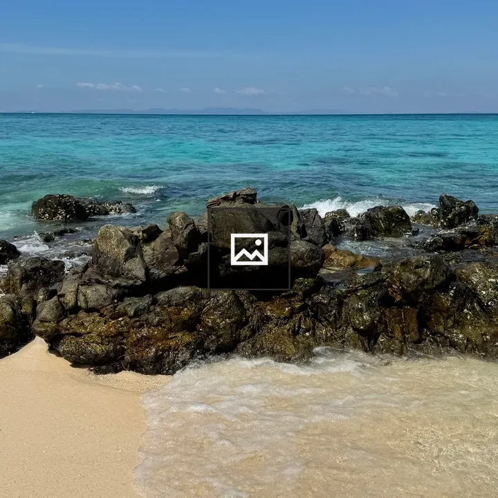 Rocks on White Sand Beach