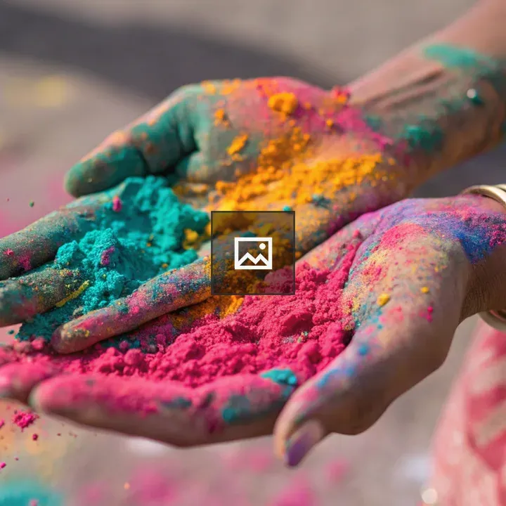 Hands with colorful Holi powders