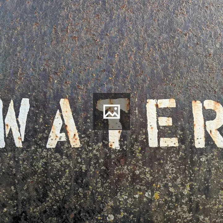 Roughly Painted Water Sign