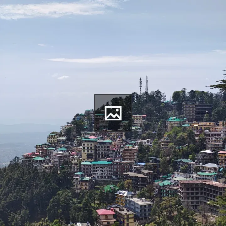 Dense hillside town with colorful buildings