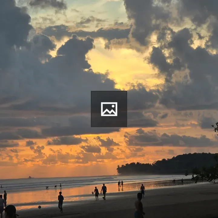 Beach at Sunset with People